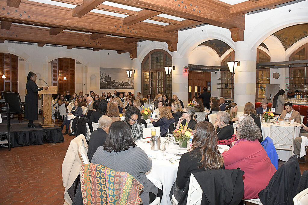 Crowd listens to panel at Our Voices Ourselves 2024